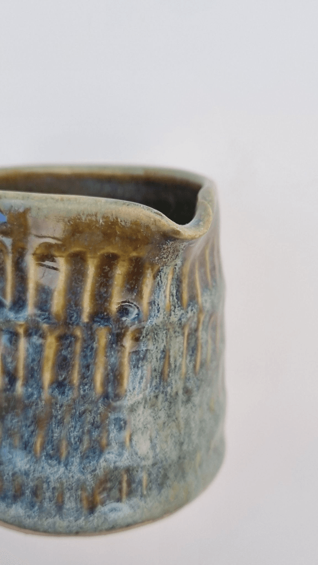 Carved Green Milk Jug
